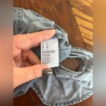 American Eagle NWT denim romper with cutout back and ruffle sleeves size S Photo 4