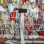 Free People  multi-colored over the shoulder top Photo 1