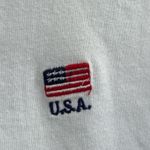 Brandy Melville John Galt Embroidered Flag Varsity Cropped Long Sleeve Top White Photo 4