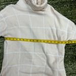 Ecowish Beige Grid Paneled turtleneck sweater Photo 1