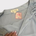 Vine & Love NWT. Light Blue Off the Shoulder Blouse with Ruched Sleeves Photo 4