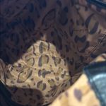 Aimee Kestenberg Black Crossbody Bag with Adjustable Strap and Flap Closure Photo 3