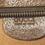 Gucci GG Supreme Clutch with Gold GG Zipper Pulls On Top Close and Front Pocket Photo 12