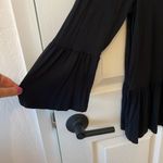 Alison Andrews  peplum top Photo 1