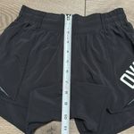 Lululemon  Hotty Hot Short 4" Black  Running Shorts OVA‎ Logo Size 4 Tall Photo 8