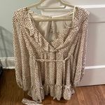 Saints + Secrets Romper Photo 0