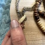 Vintage Plunder brown white circle beads triple strand necklace jewelry Photo 1