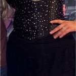 Sabrina Carpenter Black Rhinestone Heart Cut Photo 0