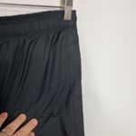 Nike ‎ windbreaker capris pants size small black Photo 1