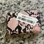 NWT credit card holder wallet. Comes with multiple pockets and chain. Pink Photo 1