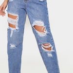 Pretty Little Thing Ripped Mom Jeans  Photo 0