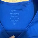 Nike  PRO | Women's Dri-FIT Royal Blue Crop Athletic Tank Top Photo 4