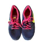 Nike athletic sneakers gray pink and yellow running tennis shoes athleisure Photo 2