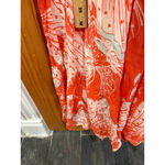 Free People  First Kiss Boho Flowy Maxi Dress in Orange and White Floral Print Photo 5