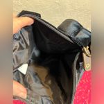 Crossbody NWOT, faux velvet black bag,
Adjust. strap, zip top, side zip pocket Photo 5