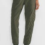 Aritzia Golden Movetech Kinetic Joggers Womens Small Green Pants Photo 0