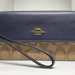 Coach Foldover Wristlet In Signature Canvas Photo 1
