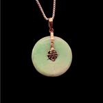 14k Yellow Gold Green Jade Circle Pendant with chain. Photo 1