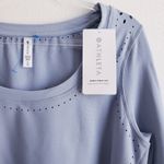 Athleta Long Sleeve Perforated Floral Reflective Sports Top Photo 2