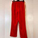 Reebok NFL Kansas City Chiefs windbreaker pants red & yellow Women’s Size Large Photo 3