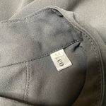 Leo Black Sleeveless Shell Tank Top w/ Gold Button Detail & Back Cutout Size M Photo 3