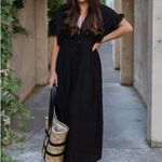 Get ready for the perfect beach party in this ruffle cover up. has an attracted deep V Photo 7