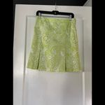 IZOD  Lime Green and White golf skort size 6. Photo 1
