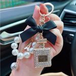 Elegant Beaded Pearls & Rhinestone Perfume Bottle Keychain with Bow, Alloy Metal Pink Photo 1