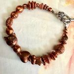 Copper tone cat heart star beaded bracelet Photo 0