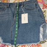 Cello  women's medium denim mini skirt distressed edges light blue zip & button Photo 1