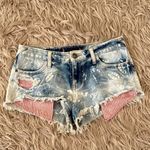 Free People Shibori cutoff shorts Photo 1