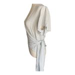 Billabong -PLAID WRAP TOP-SIZE MEDIUM Super cute light blue plaid, wrap top, excellent condition, size medium Measure: Bust: armpit to armpit 19 inches Lengths: shoulder seam to bottom 20 inches Photo 1