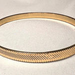 Vintage gold toned ridged quiet luxury thin bracelet Photo 0