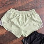 Lululemon Lot of 2  Hotty hot shorts size 4 Green and Black Photo 2