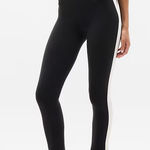 Athleta  Elation Ultra High Rise Sport Stripe Split Slim Flare black & white Photo 0