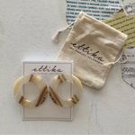 Ettika x Revolve Clear & Natural Round Flat Hoop Statement Earrings Photo 1