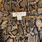 Ultra Flirt snakeskin front knot blouse Photo 1