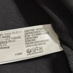 Disney  spirit jersey sz small black long sleeve white raised lettering pullover Photo 3