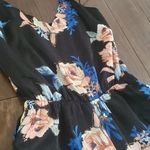 Socialite Lined beautiful black jumpsuit with flowers size small by  very flatter Photo 1