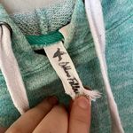Others Follow Teal Hoodie Photo 1