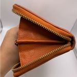 Michael Kors Burnt Orange Zip Around Wallet Photo 6