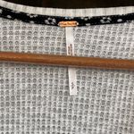 Free People  Auxton Thermal Wrap Top with a floral print Photo 12