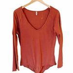 Free People Bodysuit Long Sleeves Burnt Orange Scoop Neck Cotton Raw Hem NWOT Photo 0