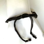Silver tone red skeleton black cord bracelet Photo 2