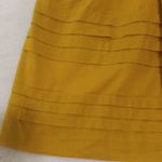 Anthropologie  Odille Drawing Parallels Pleated Pocket Skirt in Marigold Yellow Photo 3