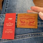 Levi's 721 High Rise Skinny Jeans with rip knee size 25 Photo 12