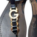G by Guess Guess black patten leather strap sandals with gold logo on top Photo 1