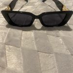 Sunglasses Bllack With Gold Trim.. Worn once Photo 2