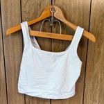 All In Motion  White Tank Top Photo 0