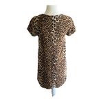 Line and Dot  Stunning leopard print tunic dress, fully lined, short sleeves, back zipper, excellent condition, size xs Measurements: Bust: armpit to armpit 17 inches  Length: shoulder seam to bottom 32  Photo 5